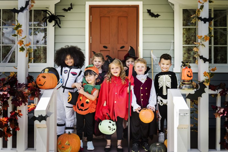 group of kids in Raleigh wearing Halloween costumes